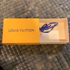 Louis Vuitton box and ribbon